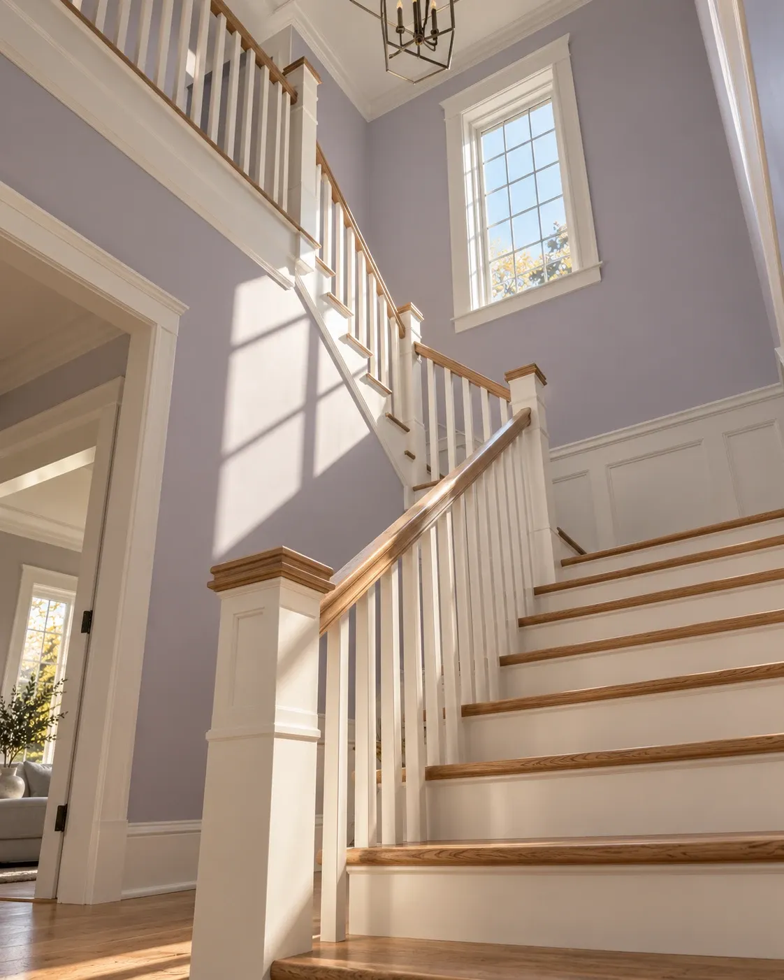 Illustration: painted stairwell with ivory walls and a deep green handrail